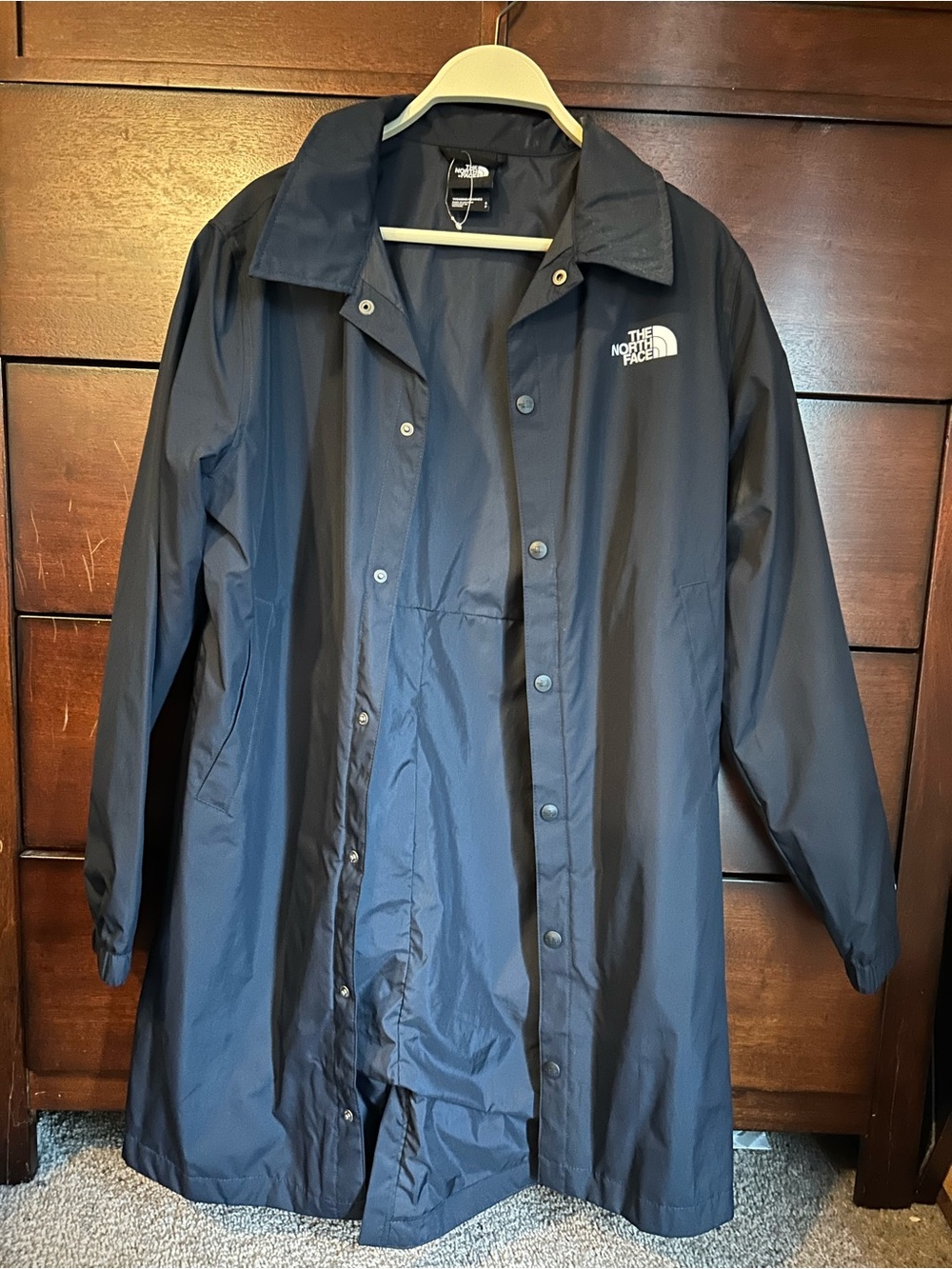 The North Face Navy Blue Women's Jacket with White Logo